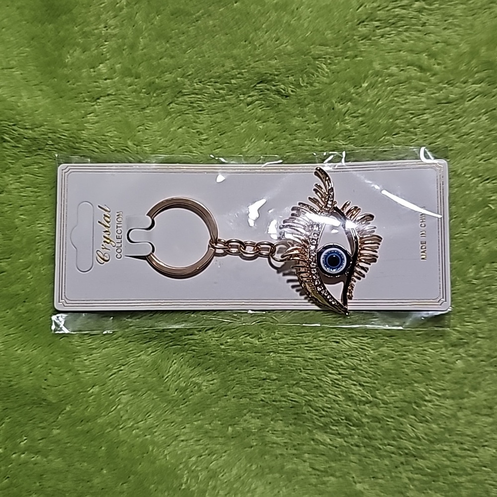 Crystal Collection Eye Bag Charm